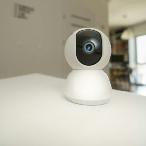 A small camera sitting on top of a white table